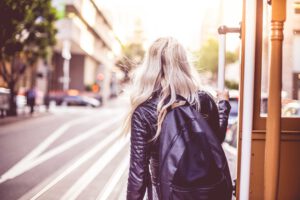 Young Woman Enjoying Ride on an Iconic Cable Car in San Francisco 6